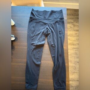 Athleta salutation stash tight high rush 7/8 leggings